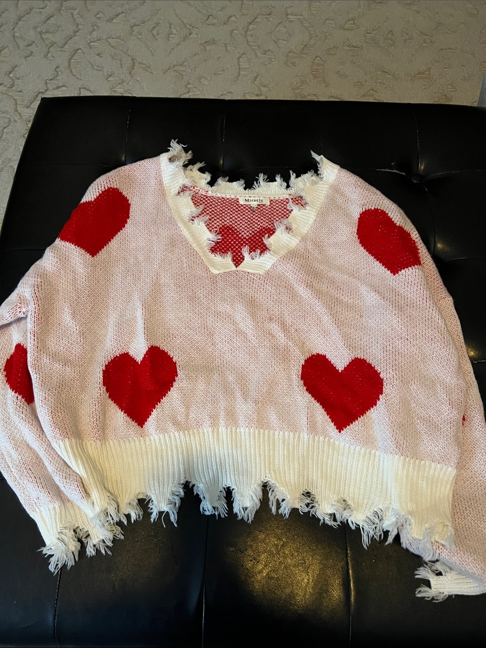 Miracle Pink Knit V-Neck Sweater with Red Heart Details